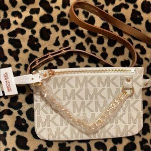Michael Kors cream woman’s belt bag.